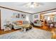 Comfortable living room with ample seating and direct access to the dining area at 8262 Fairview Nursery Rd, Hollywood, SC 29449