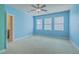 Large bedroom with ample natural light and a ceiling fan at 8475 Athens Way, North Charleston, SC 29420