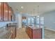 Modern kitchen features granite counters, an island, and stainless steel appliances at 8475 Athens Way, North Charleston, SC 29420