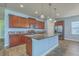 Modern kitchen with granite countertops, stainless steel appliances, and a center island at 8475 Athens Way, North Charleston, SC 29420