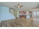 Bright open concept living area seamlessly connects the kitchen, dining, and Gathering areas at 8475 Athens Way, North Charleston, SC 29420