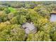 Charming home nestled among mature trees, offering privacy and a serene natural setting at 93 Surfscoter Ln, Kiawah Island, SC 29455