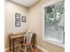 Small office nook with a window, hardwood floors and a small desk at 93 Surfscoter Ln, Kiawah Island, SC 29455