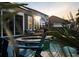 Backyard showcasing a pool, spa, and outdoor seating area, perfect for relaxation and entertaining at 108 Whaler Ave, Summerville, SC 29486