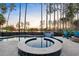 Beautiful backyard pool with spa, sunroom, and comfortable seating at this home at 108 Whaler Ave, Summerville, SC 29486