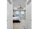 Bedroom featuring plush carpet, tray ceiling, and windows with plantation shutters at 108 Whaler Ave, Summerville, SC 29486