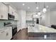 Well-equipped kitchen featuring stainless steel appliances and a spacious center island at 108 Whaler Ave, Summerville, SC 29486