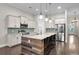 Spacious kitchen features an island, stainless steel appliances, and pendant lighting at 108 Whaler Ave, Summerville, SC 29486
