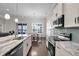 Open kitchen featuring a spacious center island and modern stainless steel appliances at 108 Whaler Ave, Summerville, SC 29486