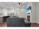 Inviting space featuring seamless flow between living, dining, and kitchen areas, plus hardwood floors at 108 Whaler Ave, Summerville, SC 29486