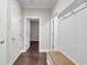 Mudroom with dark wood floors, coat hooks, and cushioned bench at 108 Whaler Ave, Summerville, SC 29486