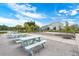 Picnic area with picnic tables, garden boxes and view of new construction in the background at 108 Whaler Ave, Summerville, SC 29486