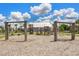 Community playground featuring swings and a play structure, perfect for Gathering fun and recreation on a sunny day at 108 Whaler Ave, Summerville, SC 29486