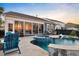 Inviting backyard pool and spa featuring cool blue tile with outdoor seating at 108 Whaler Ave, Summerville, SC 29486