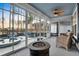 Relaxing screened porch with view of a pool and lake at 108 Whaler Ave, Summerville, SC 29486
