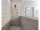 Bathroom with glass and tile shower with built in shelves and shower wand at 108 Whaler Ave, Summerville, SC 29486