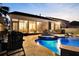 Backyard featuring a luxurious pool, hot tub, and patio area with comfortable seating at 108 Whaler Ave, Summerville, SC 29486