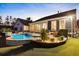 Backyard featuring a luxurious pool, hot tub, spacious patio, and manicured landscaping at 108 Whaler Ave, Summerville, SC 29486