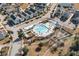 Aerial view of community pool area, surrounded by lush landscaping and offering a resort-like ambiance at 1107 Bellwether Ln, Summerville, SC 29485
