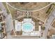 Stunning aerial view of a community pool area with surrounding amenities and lush landscaping at 1107 Bellwether Ln, Summerville, SC 29485