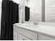 Clean bathroom featuring a modern vanity, a large mirror, and a shower with a curtain at 1107 Bellwether Ln, Summerville, SC 29485