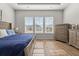 Bedroom with hardwood floors, natural light, and views of the neighborhood at 1107 Bellwether Ln, Summerville, SC 29485