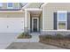 Inviting front entrance with a decorative wreath and well-maintained landscaping at 1107 Bellwether Ln, Summerville, SC 29485
