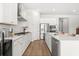 Well-lit kitchen featuring stainless steel appliances, white cabinets, and a modern design at 1107 Bellwether Ln, Summerville, SC 29485