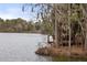 Scenic view of the lake and a wooden gazebo at 1107 Bellwether Ln, Summerville, SC 29485