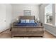 Spacious bedroom with a large bed, bedside tables, and natural light streaming in through the window at 1107 Bellwether Ln, Summerville, SC 29485