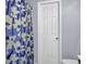 Bathroom featuring a floral shower curtain and white door at 112 Avonshire Dr, Summerville, SC 29483
