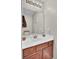 The bathroom features a white countertop vanity, a framed mirror, and classic fixtures at 112 Avonshire Dr, Summerville, SC 29483