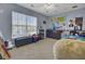 Bedroom with window, world map, and playful decor offers a fun and educational space at 112 Avonshire Dr, Summerville, SC 29483