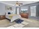 Cozy bedroom featuring a ceiling fan, wood dresser with TV, and lots of natural light at 112 Avonshire Dr, Summerville, SC 29483
