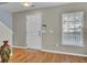 Clean, light-filled foyer features wood floors, a front door, and a window at 112 Avonshire Dr, Summerville, SC 29483