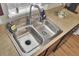 The kitchen features a stainless steel sink and light countertops at 112 Avonshire Dr, Summerville, SC 29483
