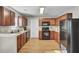 Well-maintained kitchen with stainless steel appliances, wooden cabinets, and ample counter space at 112 Avonshire Dr, Summerville, SC 29483
