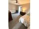Cozy bedroom featuring a bed, crib, chair, and dresser for a comfortable and functional space at 122 Mellard Dr, Goose Creek, SC 29445