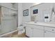 Bathroom with enclosed shower, white vanity and white fixtures at 130 River Landing Dr # 4209, Charleston, SC 29492
