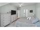 Inviting bedroom with neutral tones, a plush bed, and ample storage space from the dresser at 130 River Landing Dr # 4209, Charleston, SC 29492