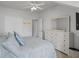 Bedroom featuring a ceiling fan, TV, and blue bedding at 130 River Landing Dr # 4209, Charleston, SC 29492