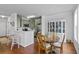 Charming eat-in kitchen features modern appliances, a wooden table, and a cozy ambiance at 130 River Landing Dr # 4209, Charleston, SC 29492