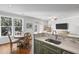 Open-concept living space showcasing the kitchen, dining area, and living room with natural light at 130 River Landing Dr # 4209, Charleston, SC 29492