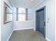 Hallway with elevator, area rug, and beautiful decorative mirror with a chandelier reflection at 1581 Cambridge Lakes Dr, Mount Pleasant, SC 29464