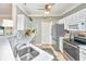 Clean kitchen with stainless steel appliances, white cabinets, and ample counter space at 1581 Cambridge Lakes Dr, Mount Pleasant, SC 29464