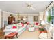 Bright and airy living room featuring neutral tones, comfortable seating, and abundant natural light at 1581 Cambridge Lakes Dr, Mount Pleasant, SC 29464