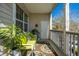 Relaxing porch featuring comfortable seating, natural light, and serene outdoor views at 1581 Cambridge Lakes Dr, Mount Pleasant, SC 29464