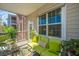 Relaxing porch featuring comfortable seating, natural light, and serene outdoor views at 1581 Cambridge Lakes Dr, Mount Pleasant, SC 29464