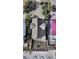 Aerial view of a coastal home, showcasing the deck, roof and surrounding landscape at 1615 E Ashley Ave, Folly Beach, SC 29439