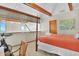 Comfortable bedroom with water views and exercise bike at 1615 E Ashley Ave, Folly Beach, SC 29439